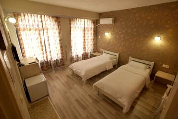 Двухместный номер с 2 отдельными кроватями в Отеле Hotel Divna